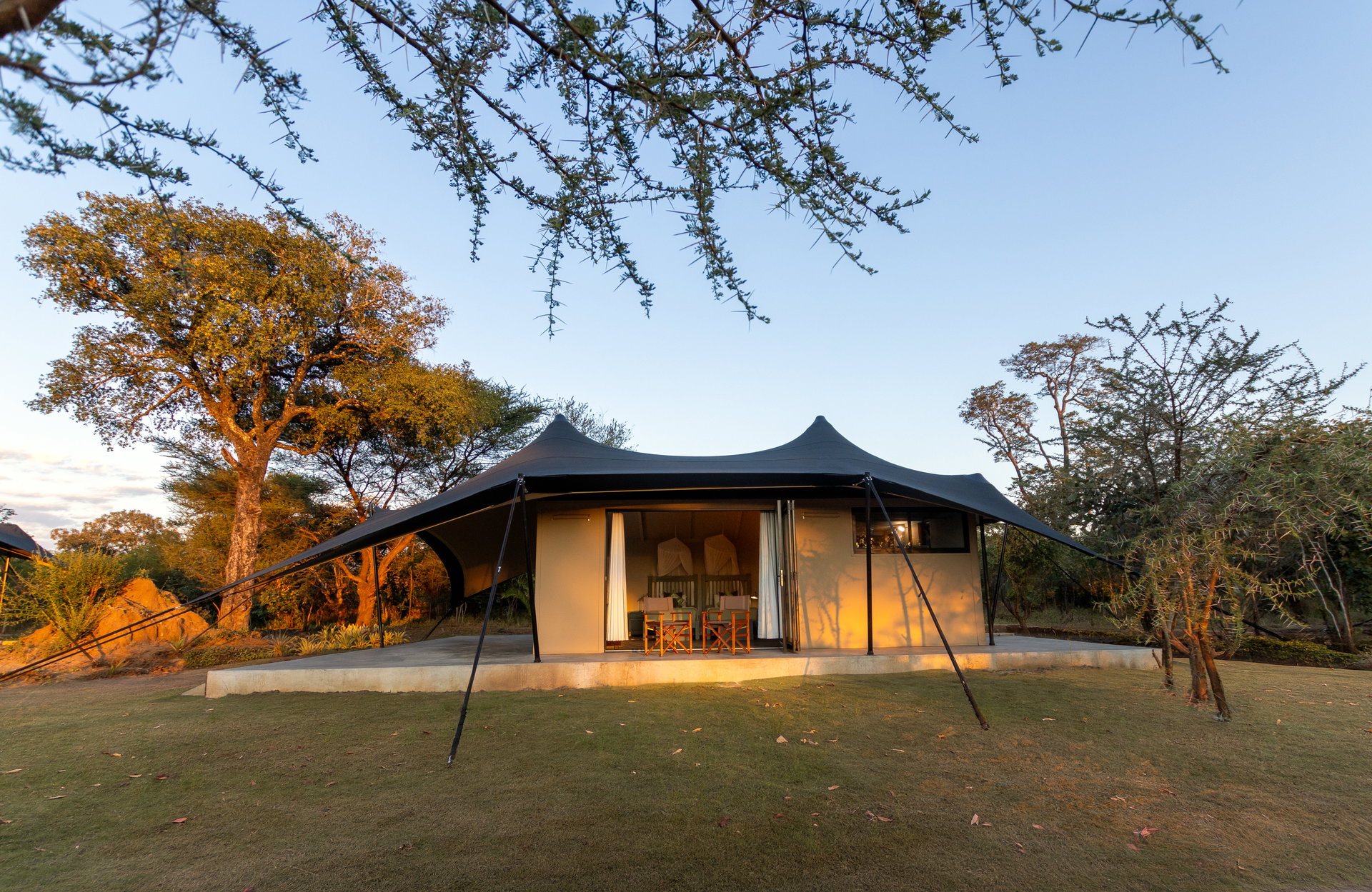 A safari tent at Tlouwana Camp in the late afternoon light